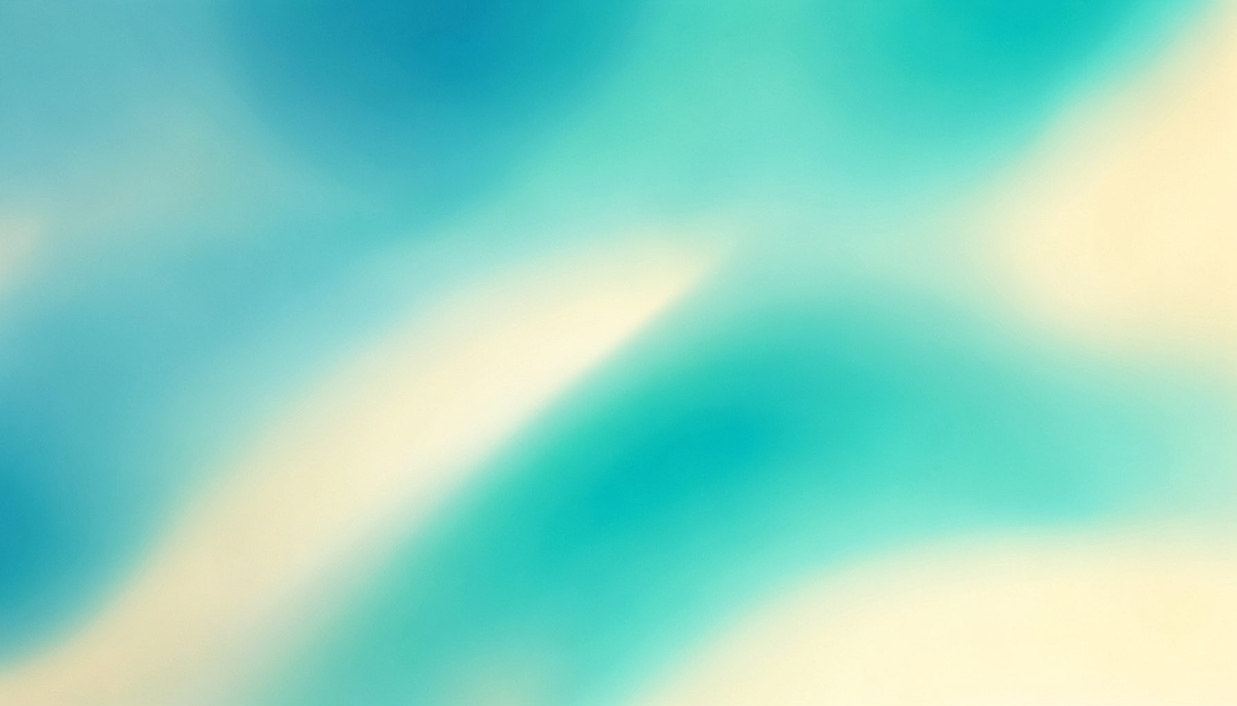 Wide gradient field suggesting cinema-scale imagery with cool blue-green and warm cream tones